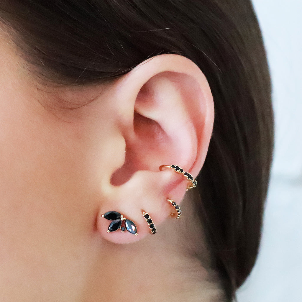 Nesti leaf rhodium crystal leaf black stud