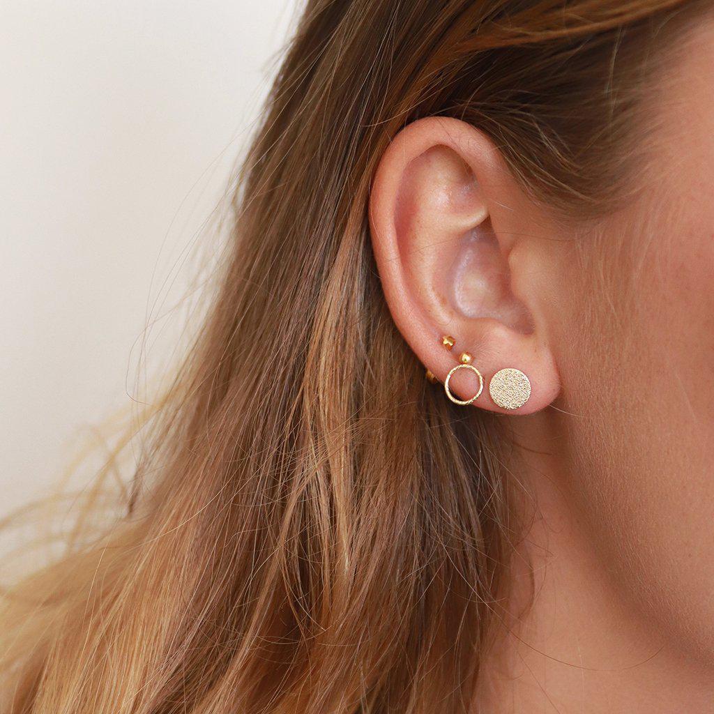 Odra hollow gold studs earrings